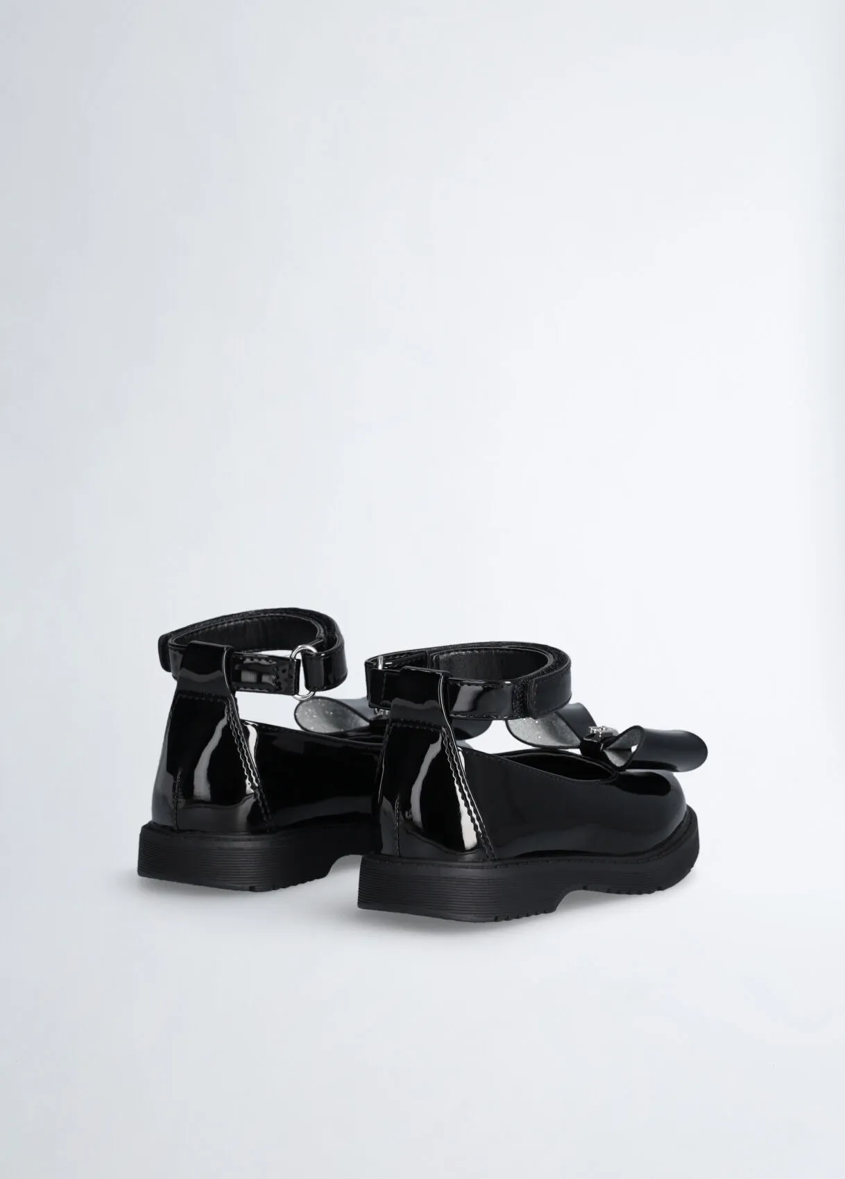 Ballerine in vernice con fiocco
