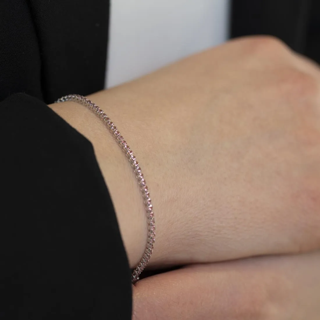 Bracciale tennis in oro con topazio rosa