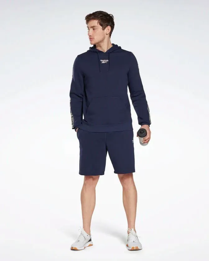 REEBOK - Felpa da uomo blu con cappuccio e banda Reebok sulla manica                                            Previous product