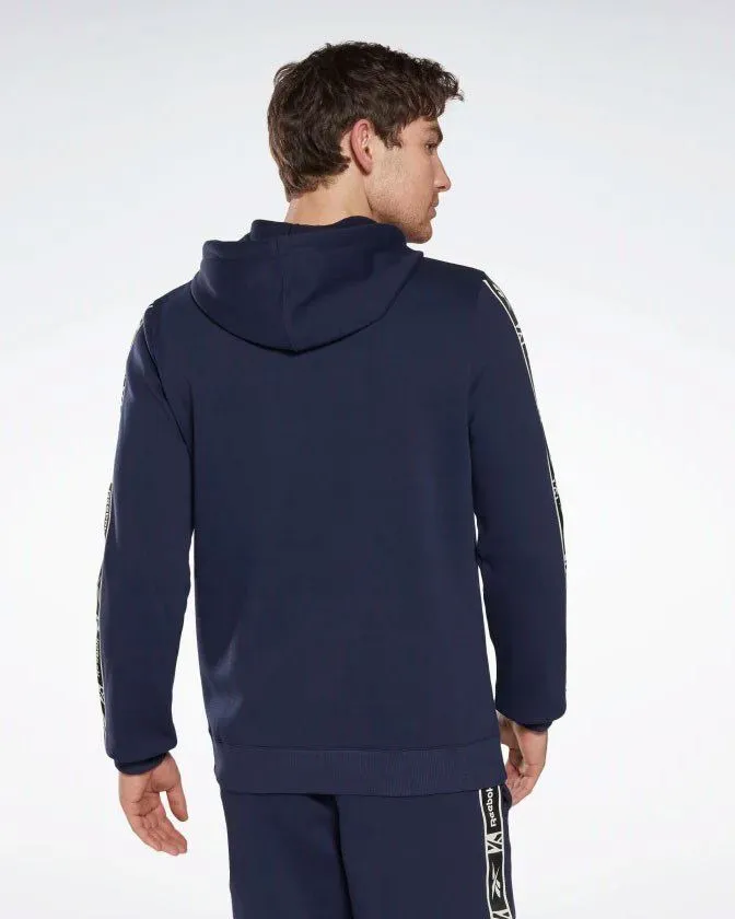 REEBOK - Felpa da uomo blu con cappuccio e banda Reebok sulla manica                                            Previous product