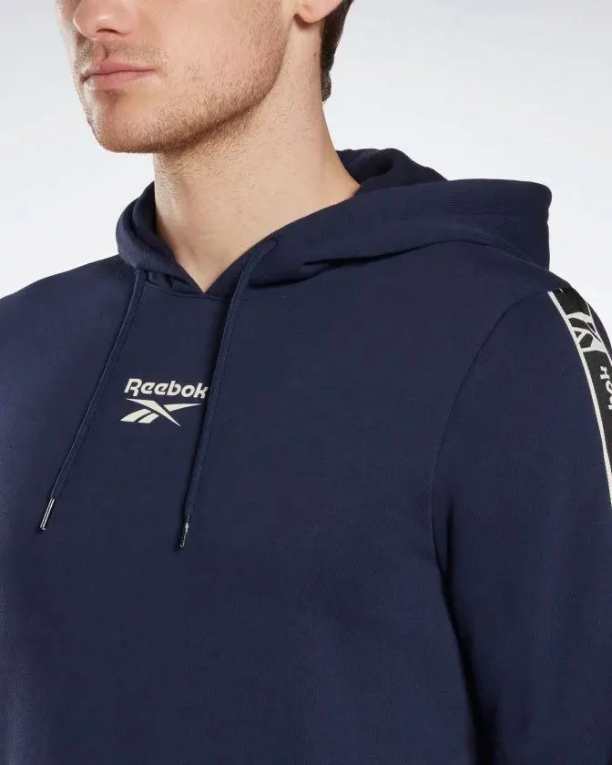 REEBOK - Felpa da uomo blu con cappuccio e banda Reebok sulla manica                                            Previous product